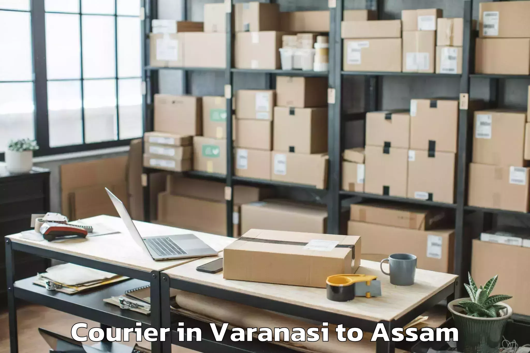 Book Varanasi to Baihata Chariali Courier Online